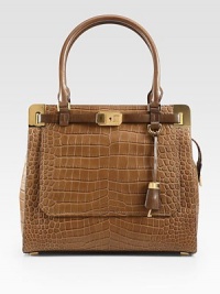 Luxurious crocodile embossed deer leather in a roomy top-handle carryall, accented with radiant hardware and contrast leather trim.Double leather top handles, 7½ dropTop zip closureProtective metal feetThree inner compartmentsOne outside flap pocketOne inside zip pocketTwo inside open pocketsFully lined13½W X 12H X 6DImported Luxurious crocodile embossed deer leather in a roomy top-handle carryall, accented with radiant hardware and contrast leather trim.Double leather top handles, 7½ dropTop zip closureProtective metal feetThree inner compartmentsOne outside flap pocketOne inside zip pocketTwo inside open pocketsFully lined13½W X 12H X 6DImported