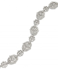 Be well-rounded. Eliot Danori's all-around Ella bracelet features sophisticated shine with glass crystals in rhodium-plated mixed metal. Approximate length: 7-1/4 inches. Be well-rounded. Eliot Danori's all-around Ella bracelet features sophisticated shine with glass crystals in rhodium-plated mixed metal. Approximate length: 7-1/4 inches.