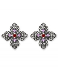 Sweet studs reminiscent of springtime. Crafted in sterling silver, Genevieve & Grace's four-petal earrings feature round-cut amethyst (1 ct. t.w.), garnet (1/5 ct. t.w.) and glittering marcasite in sterling silver. Earrings feature a clip-on backing for non-pierced ears. Approximate diameter: 1-1/8 inches.