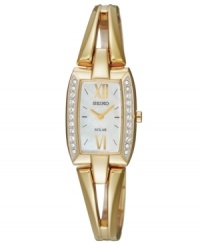 This solar-powered watch by Seiko shines with a golden bangle bracelet adorned with shimmering details. This solar-powered watch by Seiko shines with a golden bangle bracelet adorned with shimmering details.