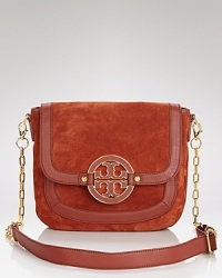 The perfectly slouchy messenger bag in buttery soft suede - every uptown girl needs one. Carry this Tory Burch crossbody for exemplary citified style. The perfectly slouchy messenger bag in buttery soft suede - every uptown girl needs one. Carry this Tory Burch crossbody for exemplary citified style.