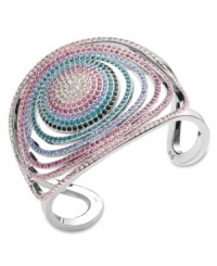Brighten up your summer outfits or make a statement on the dance floor! Swarovski's chic bangle glows in a hypnotic rainbow of crystal colors. Crafted in palladium-plated mixed metal with an open-work pattern. Approximate diameter: 2-1/8 inches. Brighten up your summer outfits or make a statement on the dance floor! Swarovski's chic bangle glows in a hypnotic rainbow of crystal colors. Crafted in palladium-plated mixed metal with an open-work pattern. Approximate diameter: 2-1/8 inches.
