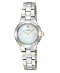 A touch of solar flair can change everything. This stylish Seiko timepiece is crafted of stainless steel and gold-tone accent bracelet and round case. Mother-of-pearl dial with gold-tone applied stick indices, hour and minute hands, and logo at twelve o'clock. Solar-powered quartz movement. Water resistant to 50 meters. Three-year limited warranty. A touch of solar flair can change everything. This stylish Seiko timepiece is crafted of stainless steel and gold-tone accent bracelet and round case. Mother-of-pearl dial with gold-tone applied stick indices, hour and minute hands, and logo at twelve o'clock. Solar-powered quartz movement. Water resistant to 50 meters. Three-year limited warranty.