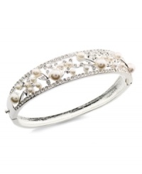 The hinged design stands out as a unique feature on Charter Club's chic bangle bracelet. Crafted in silver tone mixed metal, it's elaborately embellished with simulated pearls and glass accents. Approximate diameter: 2-1/4 inches. The hinged design stands out as a unique feature on Charter Club's chic bangle bracelet. Crafted in silver tone mixed metal, it's elaborately embellished with simulated pearls and glass accents. Approximate diameter: 2-1/4 inches.