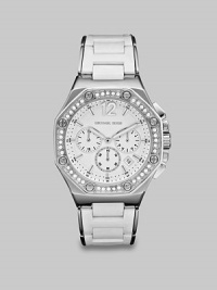 A dazzling Swarovski crystal bezel dresses up this silicone wrapped stainless steel style. Quartz movementWater resistant to 10 ATMHexagon stainless steel case, 41mm (1.6) Swarovski crystal & rivet accented bezelWhite chronograph dialNumeric and bar hour markersDate display between 4 and 5 o'clockSecond hand White silicone wrapped stainless steel link braceletImported A dazzling Swarovski crystal bezel dresses up this silicone wrapped stainless steel style. Quartz movementWater resistant to 10 ATMHexagon stainless steel case, 41mm (1.6) Swarovski crystal & rivet accented bezelWhite chronograph dialNumeric and bar hour markersDate display between 4 and 5 o'clockSecond hand White silicone wrapped stainless steel link braceletImported