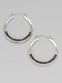 From the Eclipse Collection. Elegant hoops with an arc of faceted deep blue sapphires set in polished sterling silver.Blue sapphireSterling silverDiameter, about 1¾ PiercedImported