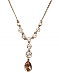 Sparkling style. Silk glass stones make Givenchy's white gold tone mixed metal necklace a glimmering must-have. Approximate length: 16 inches + 2-inch extender. Approximate drop: 1-7/8 inches. Sparkling style. Silk glass stones make Givenchy's white gold tone mixed metal necklace a glimmering must-have. Approximate length: 16 inches + 2-inch extender. Approximate drop: 1-7/8 inches.