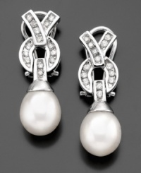 Superior beauty with a lovely design; these gorgeous earrings will always be with you. Featuring cultured freshwater pearls (9mm) and round-cut diamonds (3/8 ct. t.w.) set in 14k white gold. Approximate drop: 1 inch. Superior beauty with a lovely design; these gorgeous earrings will always be with you. Featuring cultured freshwater pearls (9mm) and round-cut diamonds (3/8 ct. t.w.) set in 14k white gold. Approximate drop: 1 inch.