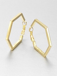 From the Play the Angles Collection. Simple geometrics are sophisticated and striking in a sleek hexagonal hoop with a gleaming golden finish.GoldtoneDiameter, about 1.5Pierced and hingedImported