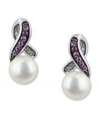 Stand out, in style. This pair of sterling silver earrings, with cultured freshwater pearls (6-1/2-7 mm), pink sapphire (1/8 ct. t.w.) and single-cut diamond accents, proves to be quite captivating. Approximate drop: 5/8 inch. Stand out, in style. This pair of sterling silver earrings, with cultured freshwater pearls (6-1/2-7 mm), pink sapphire (1/8 ct. t.w.) and single-cut diamond accents, proves to be quite captivating. Approximate drop: 5/8 inch.