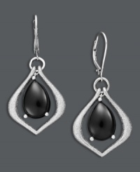 Perfect for the stylish professional - these elegant drop earrings transition effortlessly from office to evening. A unique, teardrop setting highlights polished black onyx drops (7 mm). Set in sterling silver. Approximate drop: 1-3/4 inches. Perfect for the stylish professional - these elegant drop earrings transition effortlessly from office to evening. A unique, teardrop setting highlights polished black onyx drops (7 mm). Set in sterling silver. Approximate drop: 1-3/4 inches.