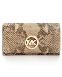 Organization with elegance. Butter-soft leather and gleaming signature hardware offer instant appeal to this MICHAEL Michael Kors wallet that discretely conceals plenty of compartments for cash, cards, coins, and other little extras. Organization with elegance. Butter-soft leather and gleaming signature hardware offer instant appeal to this MICHAEL Michael Kors wallet that discretely conceals plenty of compartments for cash, cards, coins, and other little extras.