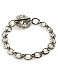 A classic sterling silver charm bracelet with signature Links of London clasp. Choose from 150 different charms. Matching necklace available. 7.5 in length. A classic sterling silver charm bracelet with signature Links of London clasp. Choose from 150 different charms. Matching necklace available. 7.5 in length.