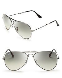 Classic Ray-Ban aviator sunglasses gain extra fashion cred with matte frames and mirrored lenses. Classic Ray-Ban aviator sunglasses gain extra fashion cred with matte frames and mirrored lenses.