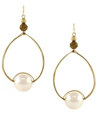 Perfectly polished. Teardrop-shaped hoops showcase luminous glass pearls. Set in gold tone mixed metal. Approximate drop: 3-1/2 inches. Perfectly polished. Teardrop-shaped hoops showcase luminous glass pearls. Set in gold tone mixed metal. Approximate drop: 3-1/2 inches.