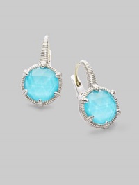 From the Eclipse Collection. A vividly colored, richly faceted turquoise sits in a sterling silver pronged setting with a graceful fluted texture. Turquoise Sterling silver Drop, about ¾ Diameter, about ½ Ear wire Imported From the Eclipse Collection. A vividly colored, richly faceted turquoise sits in a sterling silver pronged setting with a graceful fluted texture. Turquoise Sterling silver Drop, about ¾ Diameter, about ½ Ear wire Imported