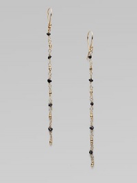A delicate style consisting of beautiful rough black diamonds and radiant 14k gold beads. Rough black diamonds14k goldDrop, about 3French hookMade in USA A delicate style consisting of beautiful rough black diamonds and radiant 14k gold beads. Rough black diamonds14k goldDrop, about 3French hookMade in USA