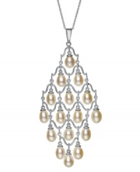 Illuminate your look. This exquisite chandelier pendant is adorned with cultured freshwater pearls (6-6-1/2 mm). Necklace crafted in sterling silver. Approximate length: 18 inches. Approximate drop: 2-1/4 inches.