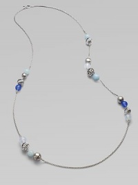 From the Elements Collection. A delicate, sterling silver chain link with smooth blue chalcedony, aquamarine, moon quartz and and multi-textural sterling silver beads in a clustered station design. Blue chalcedony, aquamarine, moon quartz Sterling silverLength, about 40Lobster clasp closureImported From the Elements Collection. A delicate, sterling silver chain link with smooth blue chalcedony, aquamarine, moon quartz and and multi-textural sterling silver beads in a clustered station design. Blue chalcedony, aquamarine, moon quartz Sterling silverLength, about 40Lobster clasp closureImported