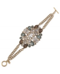 Make a dynamic statement. Carolee's bracelet is crafted from gold-tone mixed metal with colorful stone pieces adding a vibrant touch. Approximate length: 7 inches. Make a dynamic statement. Carolee's bracelet is crafted from gold-tone mixed metal with colorful stone pieces adding a vibrant touch. Approximate length: 7 inches.