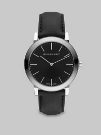 A super-slim black dial with sapphire crystal detail on a smooth leather strap. Round bezel Quartz movement Water resistant to 3 ATM Stainless steel case: 40mm (1.57) Leather strap: 20mm (0.79) Made in Switzerland A super-slim black dial with sapphire crystal detail on a smooth leather strap. Round bezel Quartz movement Water resistant to 3 ATM Stainless steel case: 40mm (1.57) Leather strap: 20mm (0.79) Made in Switzerland