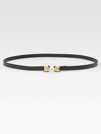 A charming, goldtone, kissing fox hook-and-eye closure adds a little shine to this skinny leather belt.Width, about .5Imported A charming, goldtone, kissing fox hook-and-eye closure adds a little shine to this skinny leather belt.Width, about .5Imported