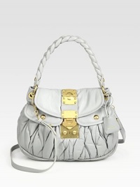 Ruched lambskin finished with a braided handle and polished goldtone hardware.Top handle, 4½ dropDetachable shoulder strap, 23 dropFlap-and-clasp coffer closureMetal letter logo detailTwo outside open pocketsOne inside zip pocketOne inside open pocketCotton/satin lining13W X 8H X 3¾DMade in Italy Ruched lambskin finished with a braided handle and polished goldtone hardware.Top handle, 4½ dropDetachable shoulder strap, 23 dropFlap-and-clasp coffer closureMetal letter logo detailTwo outside open pocketsOne inside zip pocketOne inside open pocketCotton/satin lining13W X 8H X 3¾DMade in Italy