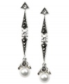 A bold sense of elegance. Judith Jack's earrings are crafted from sterling silver with marcasite (1/2 ct. t.w.), cubic zirconias (9/20 ct. t.w.) and crystals (3/10 ct. t.w.) giving way to stunning glass pearls. Approximate drop: 1-1/2 inches.