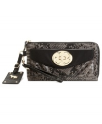 Pretty, petite and perfectly sized for the essentials, this adorable wristlet wallet from Emma Fox is all you need for any outing. Butter-soft leather is accented with golden custom hardware for a look that's unmistakably modern. Pretty, petite and perfectly sized for the essentials, this adorable wristlet wallet from Emma Fox is all you need for any outing. Butter-soft leather is accented with golden custom hardware for a look that's unmistakably modern.