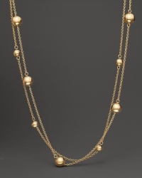 From the Pallini collection, a station bead necklace in yellow gold. With signature ruby accent. Designed by Roberto Coin. From the Pallini collection, a station bead necklace in yellow gold. With signature ruby accent. Designed by Roberto Coin.