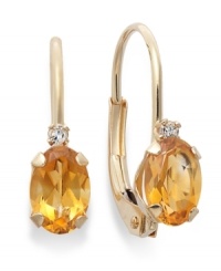 Sparkling perfection. Add a vibrant pop of color to your look with oval-cut citrine (3/4 ct. t.w.) and sparkling diamond accents. Crafted in a 14k gold leverback setting. Approximate drop: 3/4 inch. Sparkling perfection. Add a vibrant pop of color to your look with oval-cut citrine (3/4 ct. t.w.) and sparkling diamond accents. Crafted in a 14k gold leverback setting. Approximate drop: 3/4 inch.
