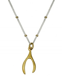 Everyone needs a little extra luck, why not wear it in style? Studio Silver's pretty wishbone necklace combines an 18k gold over sterling silver pendant and beaded accents with a sterling silver chain. Approximate length: 18 inches. Approximate drop: 7/8 inch. Everyone needs a little extra luck, why not wear it in style? Studio Silver's pretty wishbone necklace combines an 18k gold over sterling silver pendant and beaded accents with a sterling silver chain. Approximate length: 18 inches. Approximate drop: 7/8 inch.