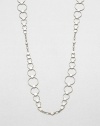 From the Dot Collection. This nature-inspired style from a socially and environmentally responsible brand features a sterling silver dot and hoop chain in a graduating design. Sterling silverLength, about 36Lobster clasp closureImported