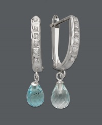 Do a double take. These delightful drops feature faceted blue topaz (2-1/2 ct. t.w.) that dangle from a polished hoop setting accented by sparkling diamonds. Crafted in 14k white gold. Approximate drop: 1 inch. Do a double take. These delightful drops feature faceted blue topaz (2-1/2 ct. t.w.) that dangle from a polished hoop setting accented by sparkling diamonds. Crafted in 14k white gold. Approximate drop: 1 inch.