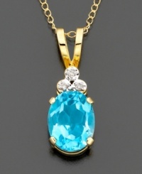 Three sparkling, round-cut diamond accents sit atop a gleaming blue topaz stone (2 ct. t.w.) Set in 14k gold. Chain measures 18 inches; drop measures 3/4 inch. Three sparkling, round-cut diamond accents sit atop a gleaming blue topaz stone (2 ct. t.w.) Set in 14k gold. Chain measures 18 inches; drop measures 3/4 inch.