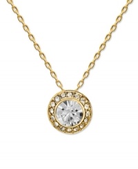 Brighten your look with style that shines! Swarovski's chic circular pendant features a round-cut crystal center stone surrounded by a halo of glittering crystals. Setting and chain crafted in gold tone mixed metal. Approximate length: 15 inches. Approximate drop: 3/4 inches. Brighten your look with style that shines! Swarovski's chic circular pendant features a round-cut crystal center stone surrounded by a halo of glittering crystals. Setting and chain crafted in gold tone mixed metal. Approximate length: 15 inches. Approximate drop: 3/4 inches.