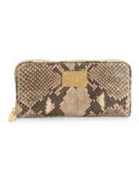 With an 18K gold logo plaque and sleek embossed python design, this wallet stylishly organizes your financial essentials. With an 18K gold logo plaque and sleek embossed python design, this wallet stylishly organizes your financial essentials.