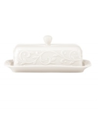 With an elegant white-on-white pattern featuring an embossed vine motif and radiant glaze, the Opal Innocence Carved covered butter dish gets your table set for refined dining every day. With an elegant white-on-white pattern featuring an embossed vine motif and radiant glaze, the Opal Innocence Carved covered butter dish gets your table set for refined dining every day.