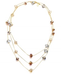Go to great lengths. This long rope necklace from c.A.K.e. by Ali Khan is sure to make a strong, striking statement whenever you wear it! Crafted with champagne glass beads, it's set in gold tone mixed metal. Approximate length: 60 inches. Go to great lengths. This long rope necklace from c.A.K.e. by Ali Khan is sure to make a strong, striking statement whenever you wear it! Crafted with champagne glass beads, it's set in gold tone mixed metal. Approximate length: 60 inches.