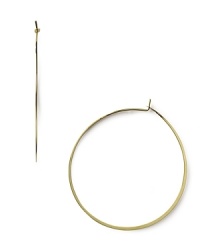 A striking yet slim silhouette makes these classic hoop earrings feminine and refined. From MICHAEL Michael Kors. A striking yet slim silhouette makes these classic hoop earrings feminine and refined. From MICHAEL Michael Kors.