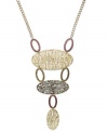 Tribally inspired. This stand-out statement necklace from T Tahari features a tri-tone mixed metal setting with bold shapes that hold the whole look together. Approximate length: 28 inches. Approximate drop: 7-1/2 inches.
