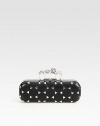 An edgy style in supple leather embellished with triangle studs accented with an iconic knuckle closure.Top clasp closureLeather lining8½W X 4H X 1½DMade in Italy