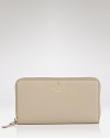 This simple wallet takes kate spade new york's day-right style to sophisticated terrain. Not only does it boast ample pockets, but there's luxe leather for added allure.
