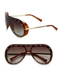 These on-trend frames feature a gentle shield shape with ultra-cool studded detail. Available in tortoise with brown gradient lens.Metal logo temples100% UV protectionMade in Italy These on-trend frames feature a gentle shield shape with ultra-cool studded detail. Available in tortoise with brown gradient lens.Metal logo temples100% UV protectionMade in Italy