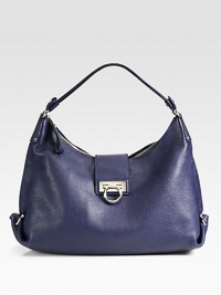 Made from supple leather, a timeless Salvatore Ferragamo design with convenient inside pockets.Shoulder strap, 9 dropFlap lock-zipper closureOne inside zipper pocketOne inside open pocketFully lined15½W X 10½H X 6DImported Made from supple leather, a timeless Salvatore Ferragamo design with convenient inside pockets.Shoulder strap, 9 dropFlap lock-zipper closureOne inside zipper pocketOne inside open pocketFully lined15½W X 10½H X 6DImported