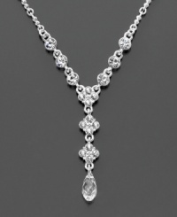 Elevate your style with a glamourous crystal cluster Givenchy necklace in silvertone. Length measures 17 inches with 3 inch extender at back and 2-1/2 drop at front.