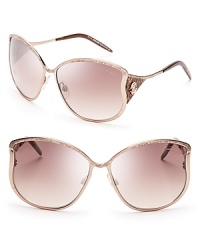 Go incognito-jungle style-in these oversized sunglasses with leopard-print sides and Roberto Cavalli logos. Go incognito-jungle style-in these oversized sunglasses with leopard-print sides and Roberto Cavalli logos.