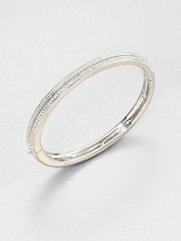 Double rows of sparkling pavé crystals encircle a classic hinged bangle with a modern square-edged design.CrystalRhodium platingDiameter, about 2½Width, about ¼Box-and-tongue claspImported Double rows of sparkling pavé crystals encircle a classic hinged bangle with a modern square-edged design.CrystalRhodium platingDiameter, about 2½Width, about ¼Box-and-tongue claspImported