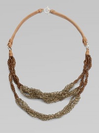 Earth tones abound this season so this design with glass beads and silver-clasped leather tie is right on trend.Glass, silver, leatherSilver closureMade in Italy Earth tones abound this season so this design with glass beads and silver-clasped leather tie is right on trend.Glass, silver, leatherSilver closureMade in Italy