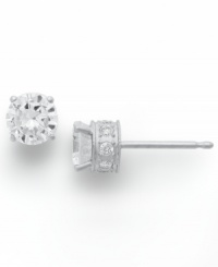 Diamond stud earrings have never sparkled so bright. This unique style features a round-cut diamond at center with a row of round-cut diamonds in the post (3/4 ct. t.w.). Four-prong setting crafted in 14k white gold. Approximate diameter: 5-1/5 mm. Diamond stud earrings have never sparkled so bright. This unique style features a round-cut diamond at center with a row of round-cut diamonds in the post (3/4 ct. t.w.). Four-prong setting crafted in 14k white gold. Approximate diameter: 5-1/5 mm.